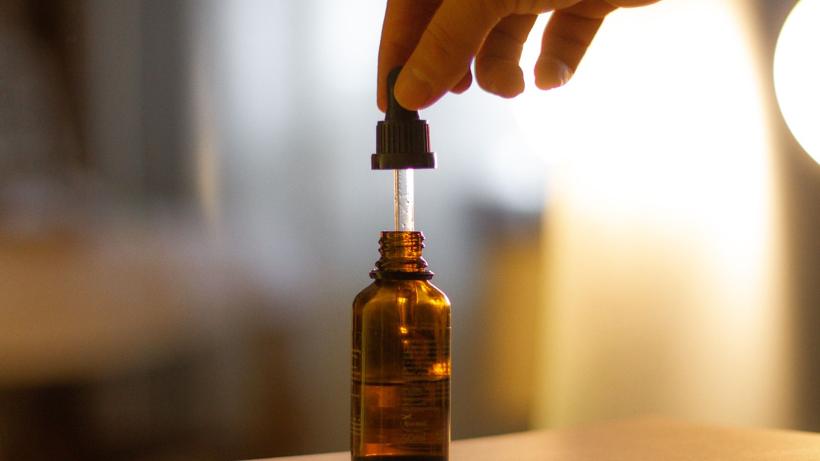 Amber dropper bottle used for concentrated consumer liquid products
